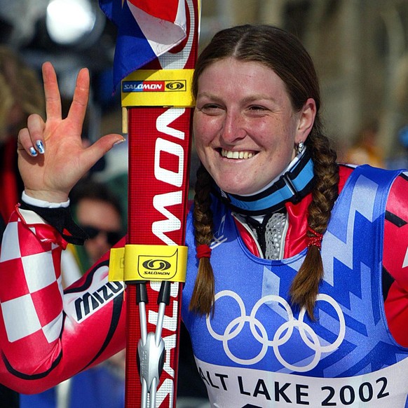 Croatian gold medallist Janica Kostelic celebrates after the women's giant slalom 2nd run for the Salt Lake 2002 Winter Olympics at Park City, Friday, February 22, 2002. (KEYSTONE/EPA PHOTO/AFP/D ...