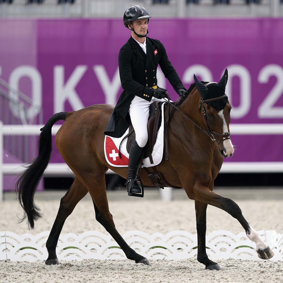 Switzerland's Robin Godel, riding Jet Set, competes during the equestrian eventing dressage at Equestrian Park at the 2020 Summer Olympics, Saturday, July 31, 2021, in Tokyo, Japan. (AP Photo/Car ...