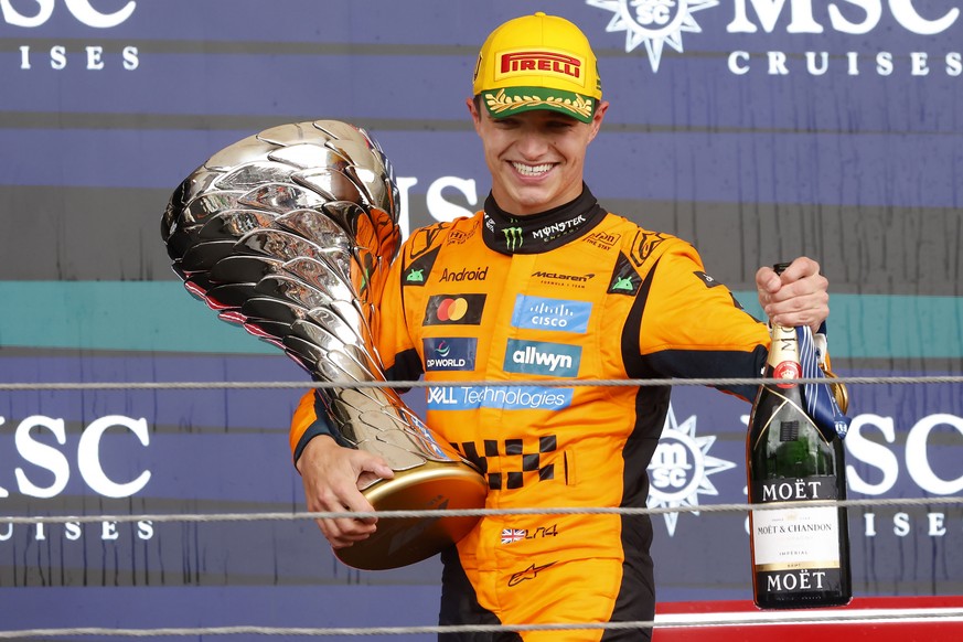 epa12515165 McLaren driver Lando Norris of Britain celebrates after winning the 2025 Formula One Grand Prix of Sao Paulo at the Autodromo Jose Carlos Pace racetrack in Interlagos, Sao Paulo, Brazil, 0 ...