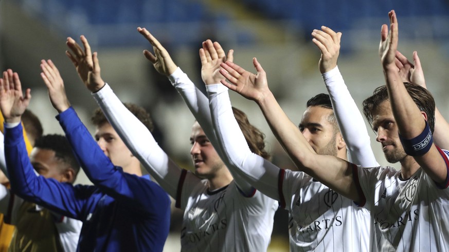 Basel players celebrates their win against APOEL during the Europa League round of 32 first leg soccer match between APOEL and FC Basel at GSP stadium, in Nicosia, Cyprus, Thursday, Feb. 20, 2019. (AP ...