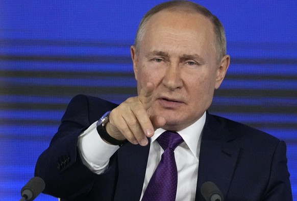 Russian President Vladimir Putin gestures while speaking during his annual news conference in Moscow, Russia, Thursday, Dec. 23, 2021. (AP Photo/Alexander Zemlianichenko)
Vladimir Putin