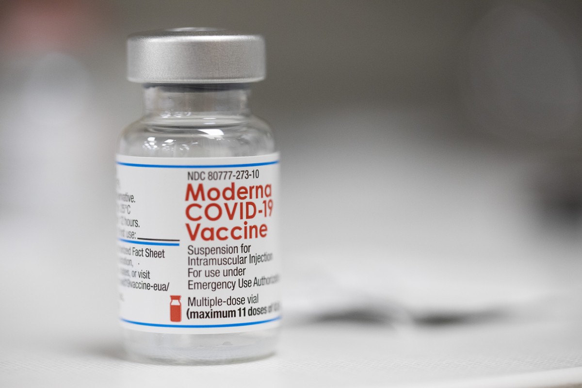 FILE- A vial of the Moderna COVID-19 vaccine is displayed on a counter at a pharmacy in Portland, Ore., on, Dec. 27, 2021. On Friday, June 3, 2022, The Associated Press reported on stories circulating ...
