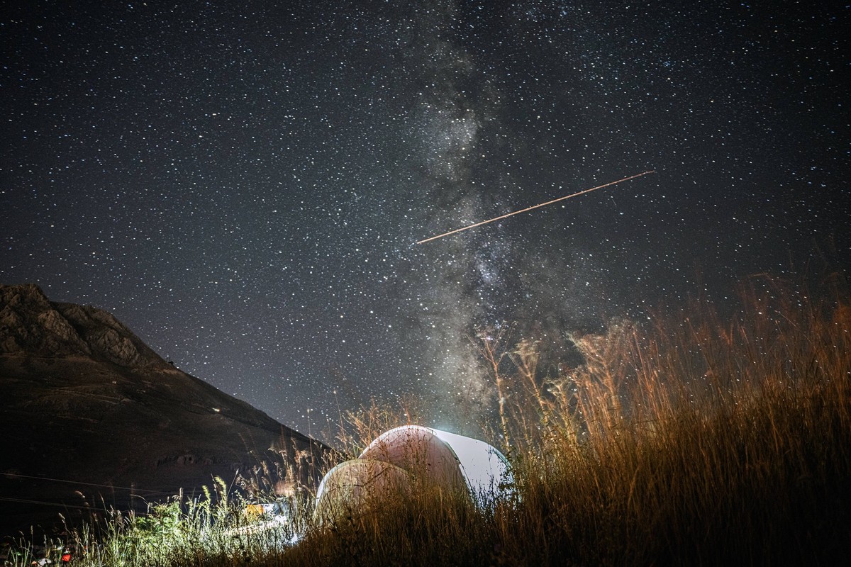 230814 -- ANTALYA, Aug. 14, 2023 -- A Perseid meteor shower is pictured over Turkish resort city of Antalya on Aug. 12, 2023. /Handout via Xinhua TRKIYE-ANTALYA-PERSEID METEOR SHOWER MustafaxKaya PUBL ...