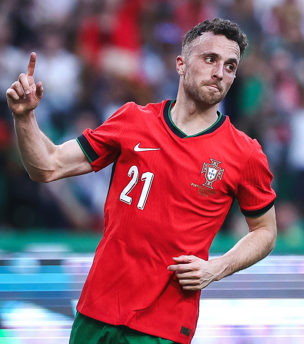 epa11390041 Portugal player Diogo Jota celebrates after scoring a goal during the international friendly soccer match between Portugal and Finland, in Lisbon, Portugal, 04 June 2024. EPA/RODRIGO ANTUN ...