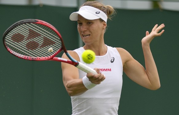 Switzerland&#039;s Viktorija Golubic returns the ball to Germany&#039;s Andrea Petkovic during their singles tennis match on day two of the Wimbledon tennis championships in London, Tuesday, June 28,  ...