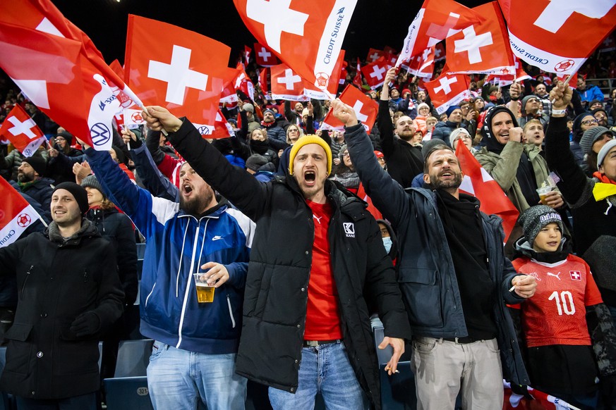 Swiss fans cheer during the 2022 FIFA World Cup European Qualifying Group C match between Switzerland and Bulgaria at the Swissporarena stadium in Lucerne, Switzerland, Monday, November 15, 2021. (KEY ...