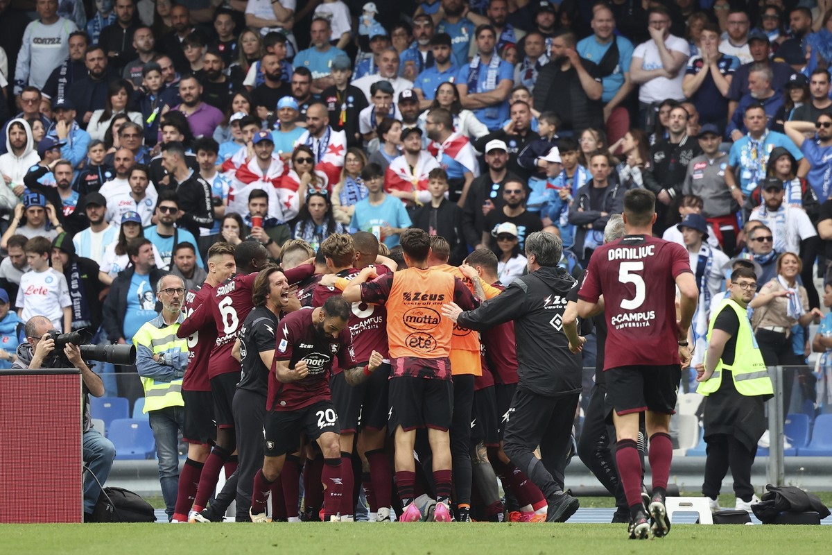 Salernitana's Boulaye Dia celebrates with teammates after scoring his side's first goal during the Serie A soccer match between Napoli and Salernitana, at the Diego Armando Maradona stadium  ...