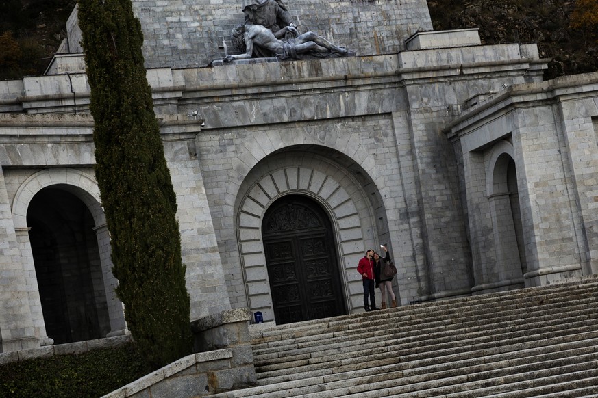Tourists take a &#039;selfie&#039; picture outside Spanish former dictator General Francisco Franco&#039;s tomb in his mausoleum in the Valle de los Caidos (Valley of the Fallen), near Madrid, Spain,  ...
