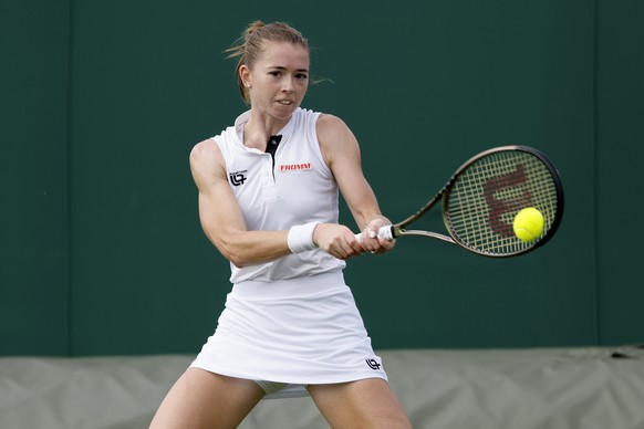 Switzerland&#039;s Simona Waltert celebrates after winning her match against Emiliana Arango of Colombia during the third round of the Qualifying competition for the All England Lawn Tennis Championsh ...