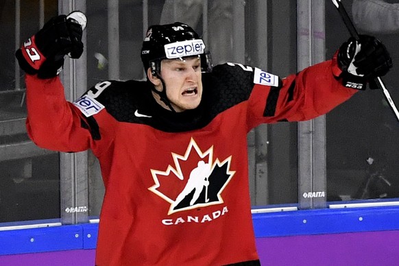 epa05976823 Canada&#039;s forward Nate Mackinnon celebrates after scoring the 2-2 equalizer during the 2017 IIHF Ice Hockey World Championship semifinal match between Canada and Russia in Cologne, Ger ...