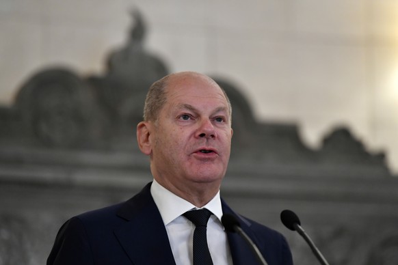 German Chancellor Olaf Scholz talks to the media during a press conference after a meeting with Greek Prime Minister Kyriakos Mitsotakis at Maximos Mansion in Athens, Thursday, Oct. 27, 2022. Scholz i ...