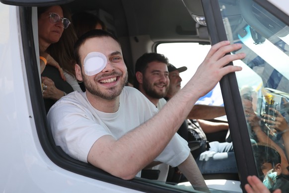 epa12478380 Released hostage Alon Ohel returns to his home in the Lavon community settlement, northern Israel, 24 October 2025, after completing hospitalization and treatment following his release fro ...