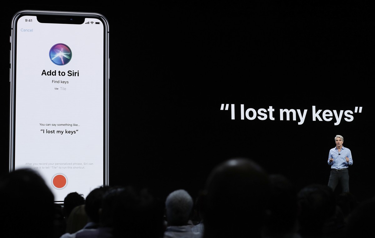 FILE - Craig Federighi, Apple's senior vice president of Software Engineering, speaks about Siri during an announcement of new products at the Apple Worldwide Developers Conference in San Jose, C ...