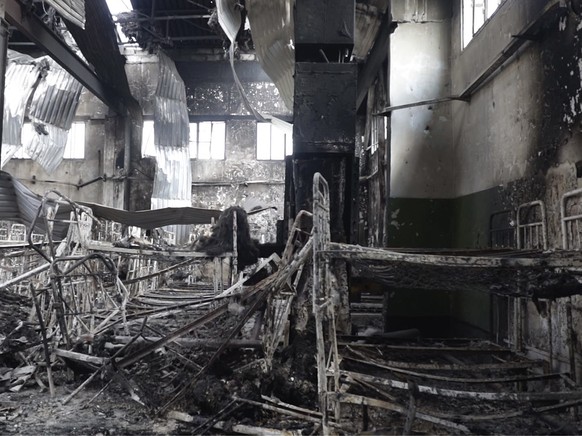 EDS NOTE: GRAPHIC CONTENT - In this photo taken from video a view of destroyed barrack at a prison in Olenivka, in an area controlled by Russian-backed separatist forces, eastern Ukraine, Friday, July ...