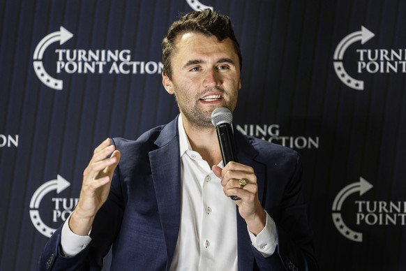 FILE - Charlie Kirk speaks during a town hall meeting on March 17, 2025, in Oconomowoc, Wis. (AP Photo/Jeffrey Phelps, File)
Charlie Kirk