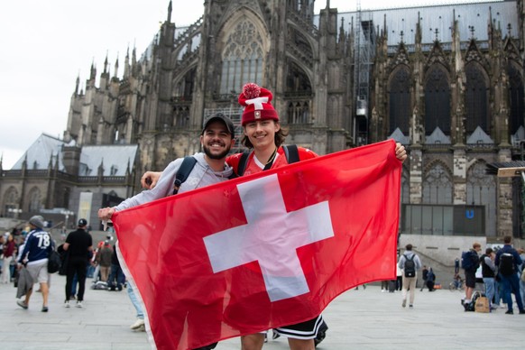 Openning Day Of UEFA In Cologne Swiss football fans are arriving in front of Dom Cathedral on the opening day of UEFA EURO, EM, Europameisterschaft,Fussball 2024 in Cologne, Germany, on June 14, 2024. ...