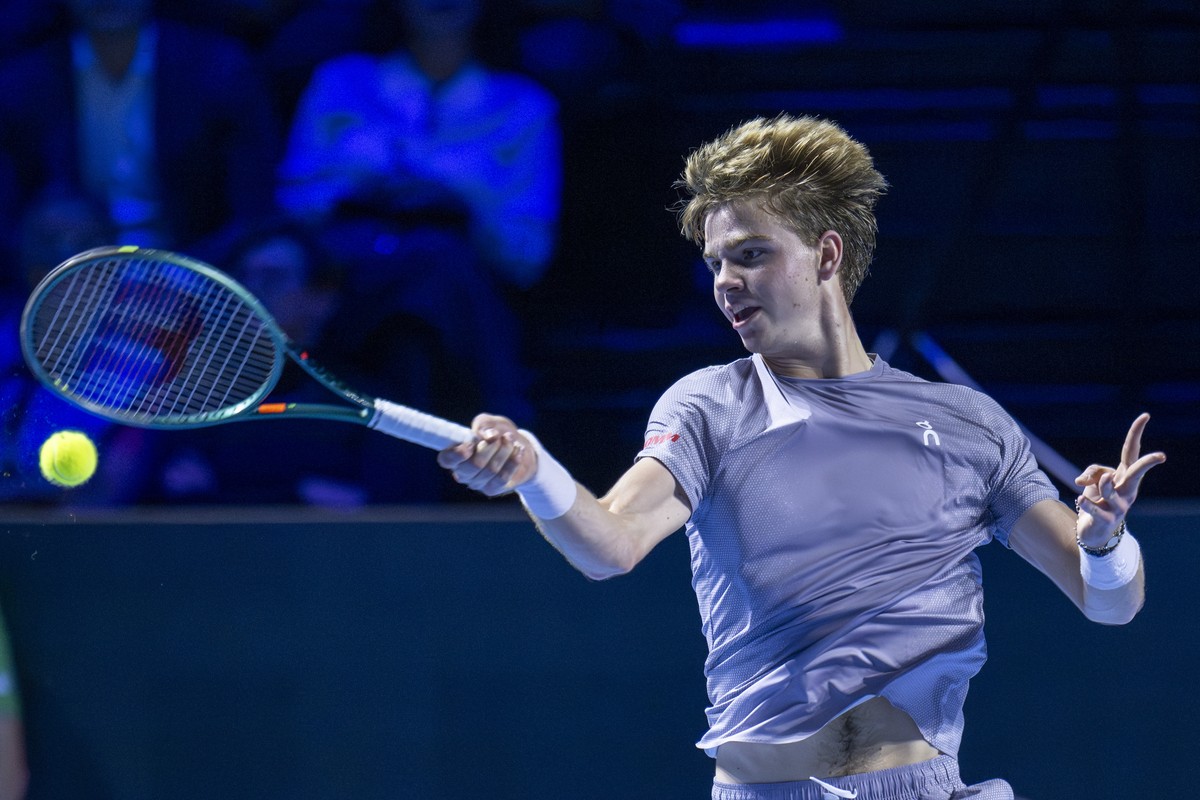 Switzerland's Henry Bernet returns a ball to Czech Republic's Jakub Mensik during their first round match at the Swiss Indoors tennis tournament at the St. Jakobshalle in Basel, Switzerland, ...