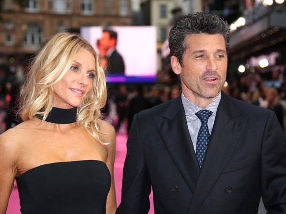 Actor Patrick Dempsey, right, and his wife Jillian Fink pose for photographers upon arrival at the World premiere of the film &#039;Bridget Jones&#039;s Baby&#039; in London, Monday, Sept. 5, 2016. (P ...