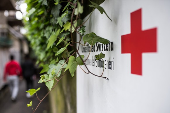 The Red Cross logo at the Center for Unaccompanied Minor Asylum Seekers (MNA), on March 19, 2017 in Paradiso, Ticino.  The Ticino Red Cross takes care of 65 girls and boys between the ages of 12 and 18 ...