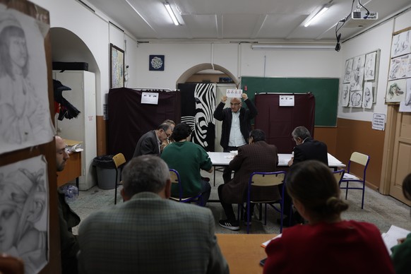 epa10627635 Officials count votes after polling stations closed in Istanbul, Turkey, 14 May 2023, as the country holds simultaneous parliamentary and presidential elections. EPA/ERDEM SAHIN