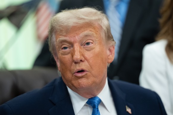 epa13028923 US President Donald Trump gives remarks during a signing ceremony for the Secure America Act in the Oval Office of the White House in Washington, DC, USA, 10 June 2026. The act requires  ...