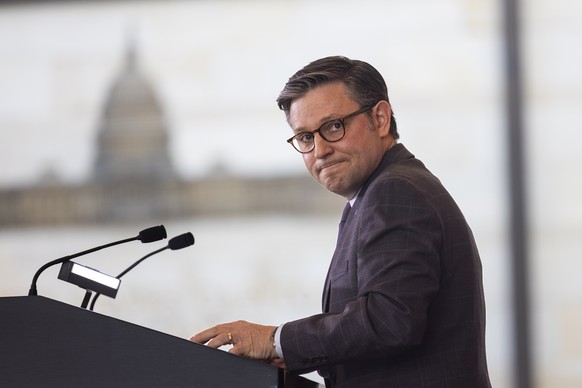 epa11234416 Republican Speaker of the House Mike Johnson speaks at a ceremony to honor WWII veterans from the 23rd Headquarters Special Troops and the 3133d Signal Services Company, known collectively ...