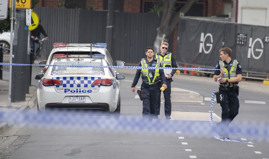 epa07505315 Victoria Police at the scene of a multiple shooting outside Love Machine nightclub in Prahran, Melbourne, Victoria, Australia, 14 April 2019. According to media reports, a man was killed a ...