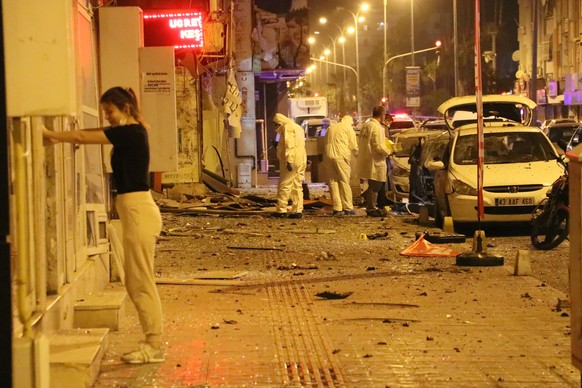epa08776171 Crime scene investigators work at the scene of an explosion in Iskenderun district of Hatay, Turkey, 26 October 2020. According the Turkish media reports there was a police slightly wounde ...