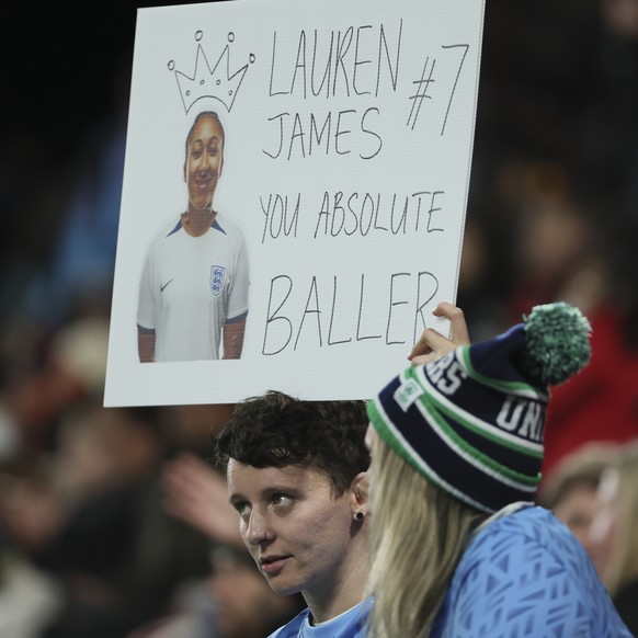 Supporters show placard of England&#039;s Lauren James during the Women&#039;s World Cup Group D soccer match between China and England in Adelaide, Australia, Tuesday, Aug. 1, 2023. (AP Photo/James E ...