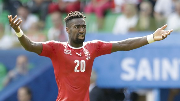 Switzerland&#039;s Johan Djourou gestures during the Euro 2016 round of 16 soccer match between Switzerland and Poland, at the Geoffroy Guichard stadium in Saint-Etienne, France, Saturday, June 25, 20 ...