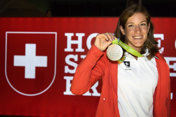 Nicola Spirig of Switzerland celebrates her silver medal in the womenÕs Triathlon in the House of Switzerland at the Rio 2016 Olympic Games in Rio de Janeiro, Brazil, on Saturday, August 20, 2016. (KE ...