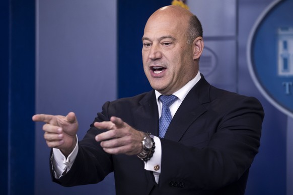 epa06233068 Director of the National Economic Council Gary Cohn responds to a question from the news media during the White House daily briefing at the White House in Washington, DC, USA, 28 September ...