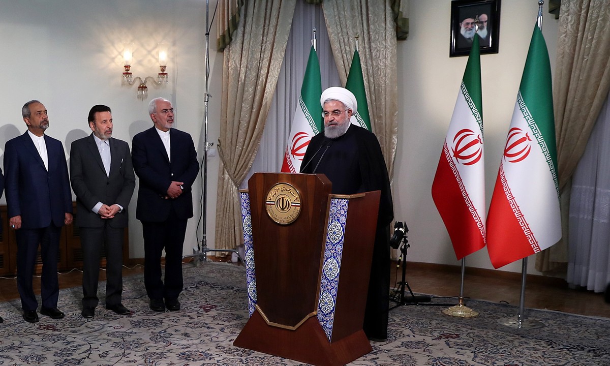 epa06720292 A handout photo made available by the Iranian presidential office shows Iranian President Hassan Rouhani making a statement over US President Trump's speech earlier, in Tehran, Iran,  ...
