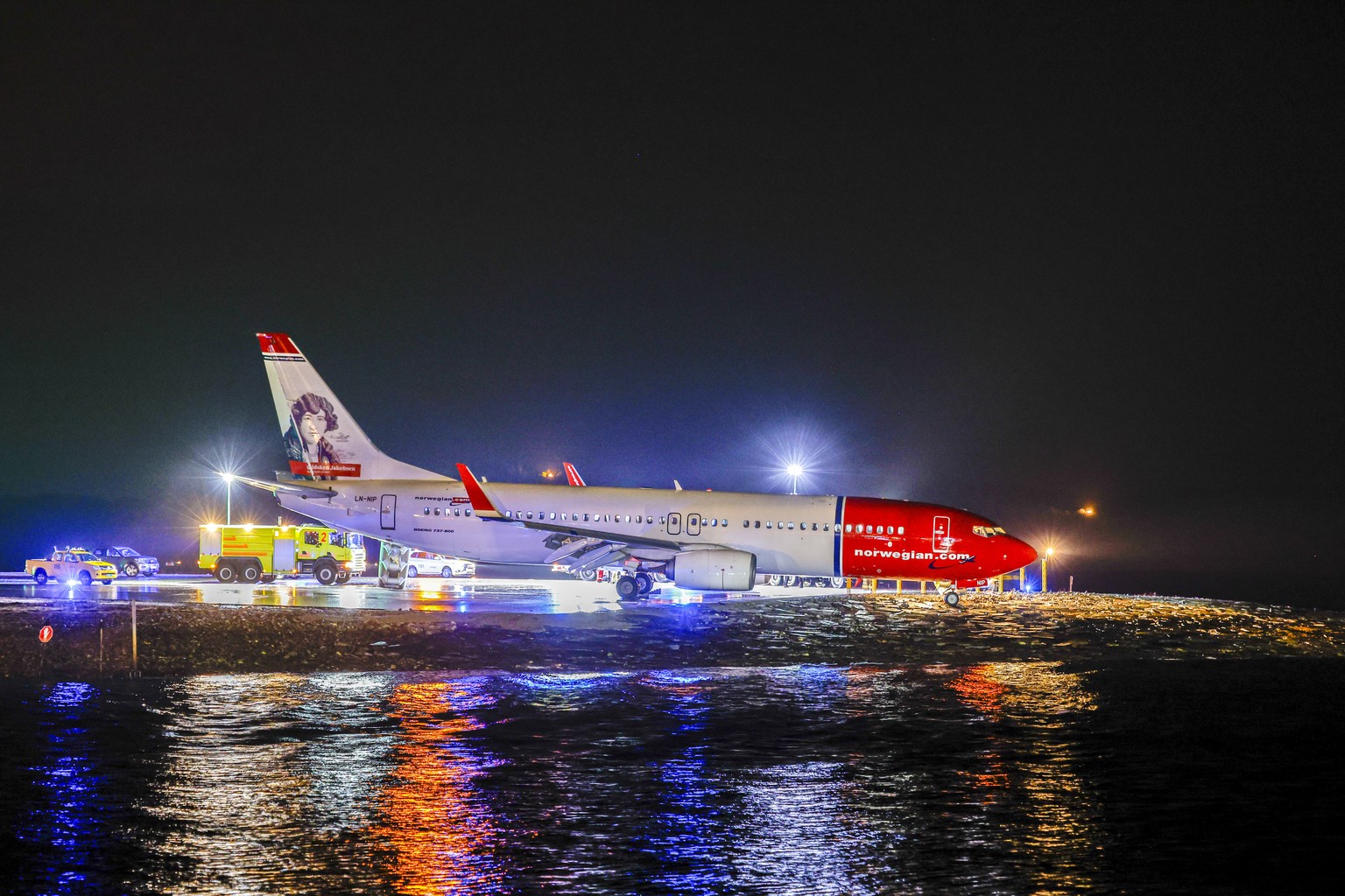 A Norwegian airliner overshoots the runway on landing at Molde Airport, Norway, Thursday Dec. 19, 2024. (Svein Ove Ekornesvaag/NTB via AP)