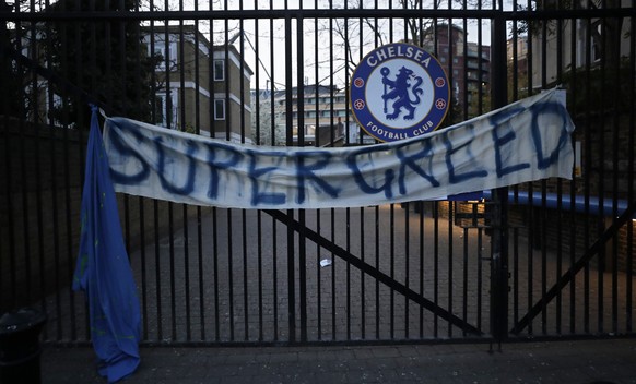 A banner hangs from one of the gates of Stamford Bridge stadium in London where Chelsea fans were protesting against Chelsea&#039;s decision to be included amongst the clubs attempting to form a new E ...