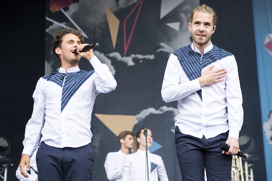 epa06085647 Luc Oggier (L) and Lorenz Haberli of the Swiss band Lo and Leduc perform on stage during the 34th Gurten Festival in Bern, Switzerland, 13 July 2017. The open air music festival runs from  ...