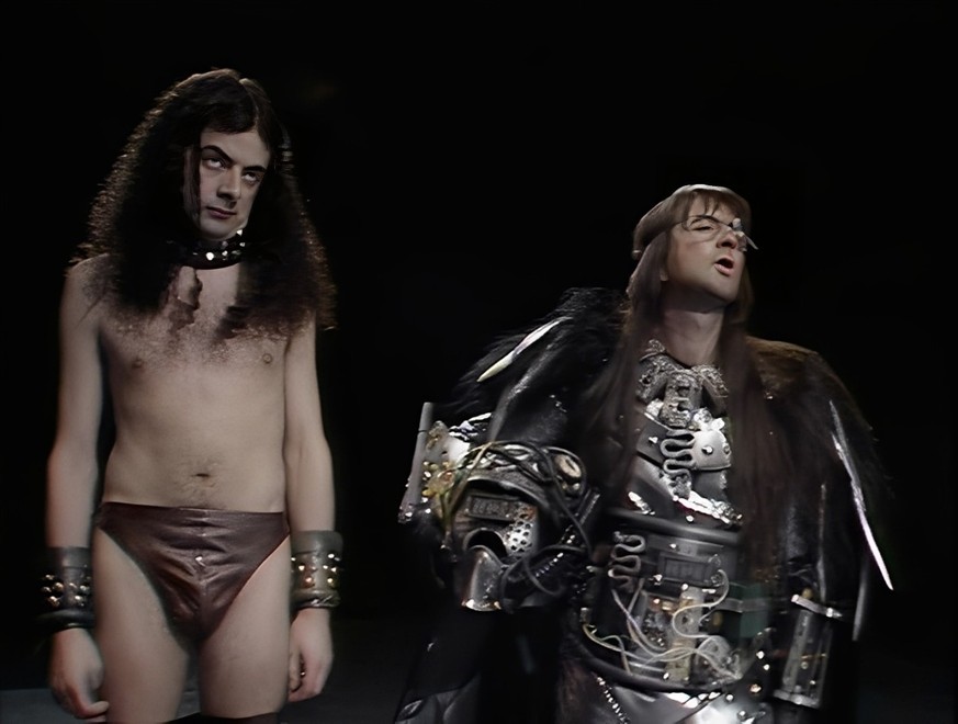 Blackadder's Christmas Carol 1988 - Rowan Atkinson and Tony Robinson BBC

https://www.imdb.com/title/tt0094754/mediaindex/?ref_=mv_close