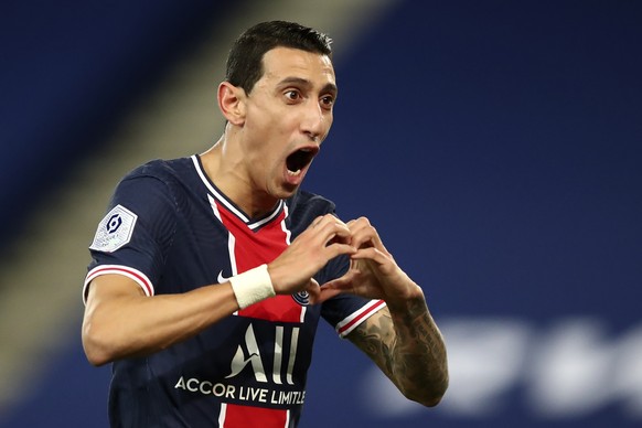 PSG&#039;s Angel Di Maria celebrates after scoring the opening goal of his team during the French League One soccer match between Paris Saint-Germain and Nimes at the Parc des Princes stadium in Paris ...