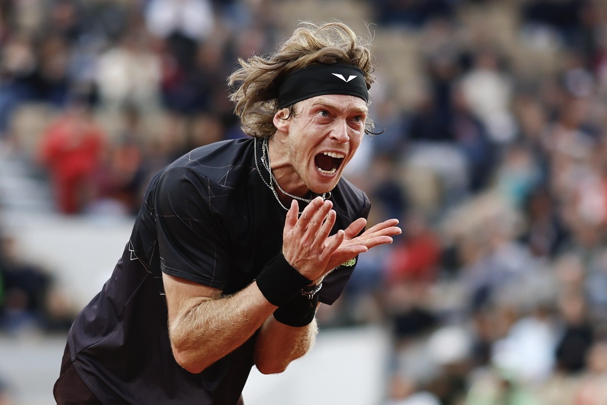 Russia's Andrey Rublev vents his frustration after missing a shot against Italy's Matteo Arnaldi during their third round match of the French Open tennis tournament at the Roland Garros stad ...