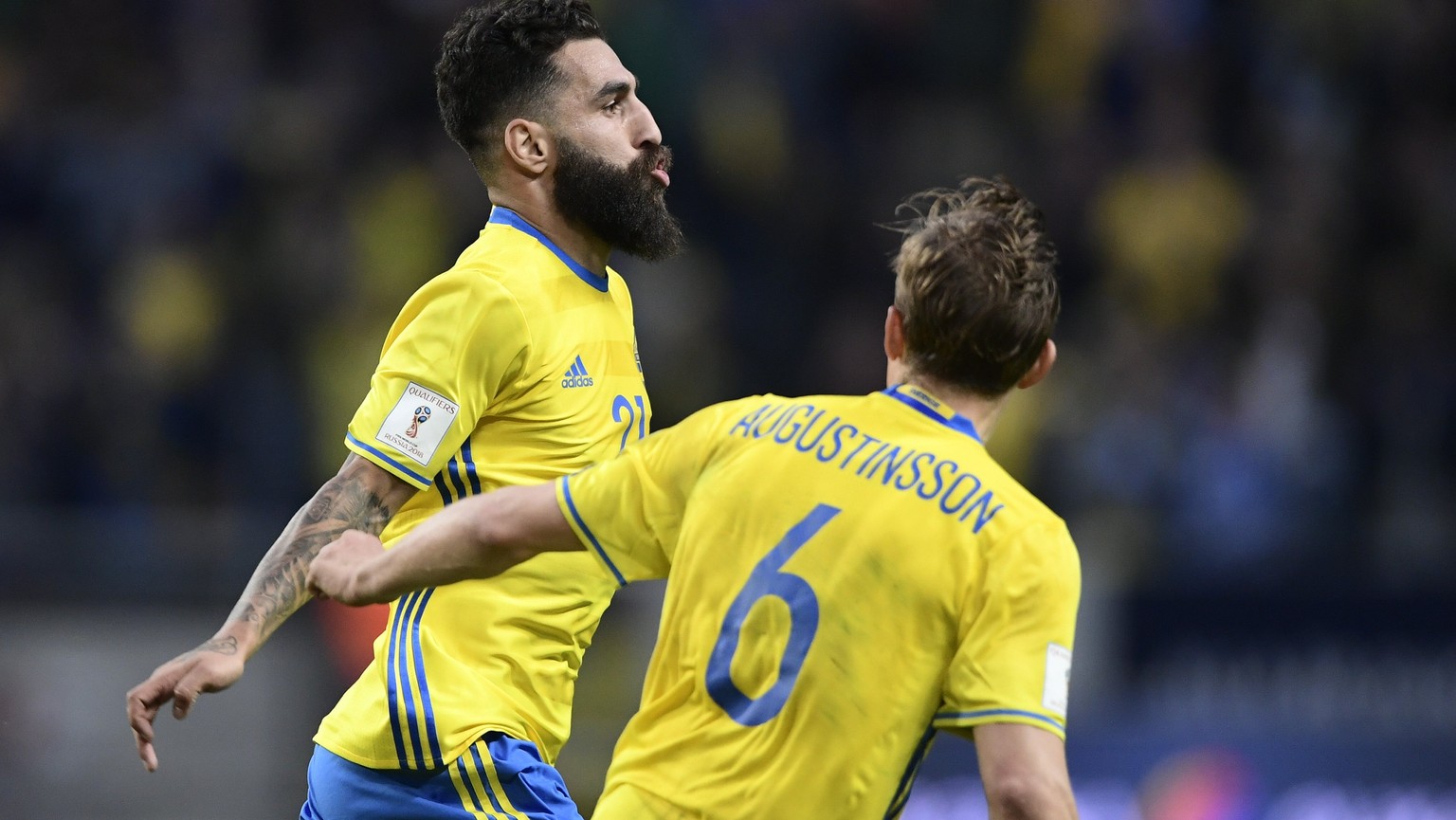 epa06019877 Sweden&#039;s Jimmy Durmaz (L) celebrates scoring with teammate Ludwig Augustinsson during the FIFA World Cup 2018 group A qualifying soccer match between Sweden and France at Friends Aren ...