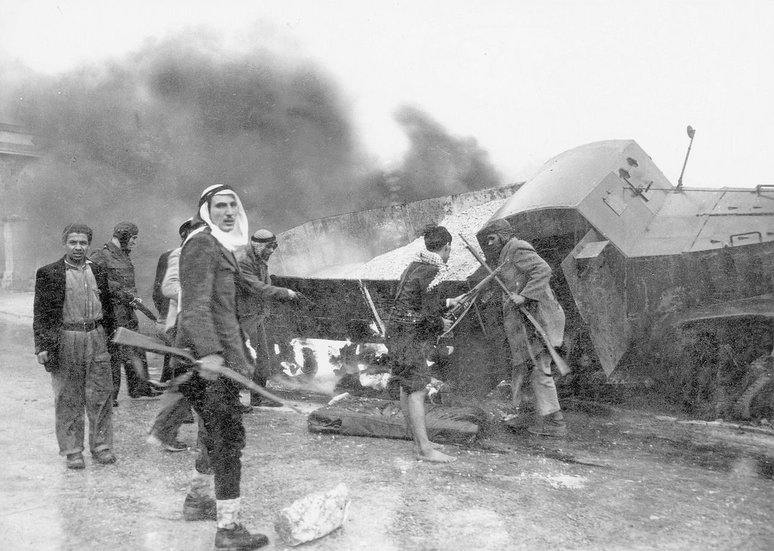 Palestinian irregulars near a burnt armored Haganah supply truck, the road to Jerusalem, 1948
https://en.wikipedia.org/wiki/1947%E2%80%931948_civil_war_in_Mandatory_Palestine#/media/File:PikiWiki_Isra ...