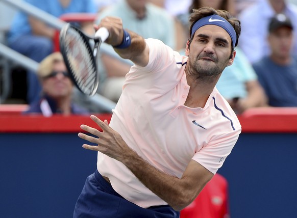 Roger Federer, of Switzerland, serves the ball to Robin Haase, of the Netherlands, during Rogers Cup tennis action, in Montreal on Saturday, Aug. 12, 2017. (Paul Chiasson/The Canadian Press via AP)