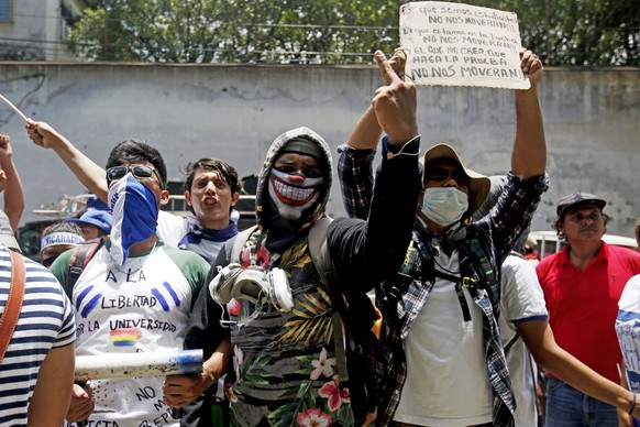 epaselect epa06919553 Hundreds protest against Daniel Ortega&#039;s Government, in Leon, Nicaragua, 30 July 2018. Students marched against the taking over of universities by the government and stating ...