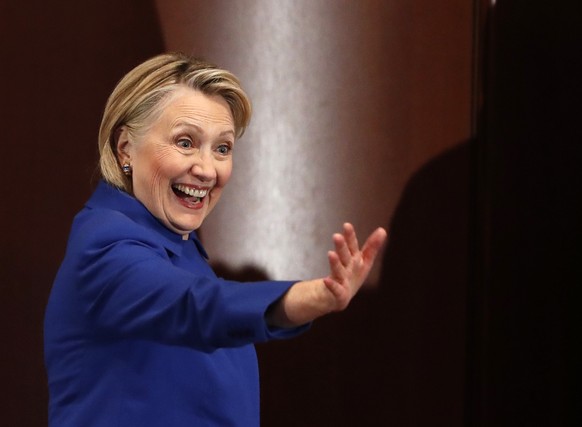 Former Secretary of State Hillary Clinton waves to well-wishers following an appearance at Barnard College with New York Governor Andrew Cuomo, Monday, Jan. 7, 2019, in New York, where the pair called ...