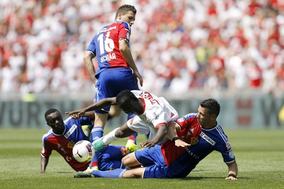 Sion&#039;s Ebenezer Assifuah, center, fights for the ball with Basel&#039;s Marek Suchy, right, Basel&#039;s Adama Traore, left, and Basel&#039;s Fabian Schaer, back, during the Swiss Cup final socce ...