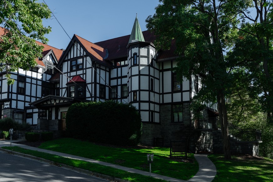 epa13283874 The Chi Phi fraternity house, now shut, pictured during a protest against Cornell University's handling of an alleged sexual assault on campus, in Ithaca, New York, USA, 05 October 20 ...
