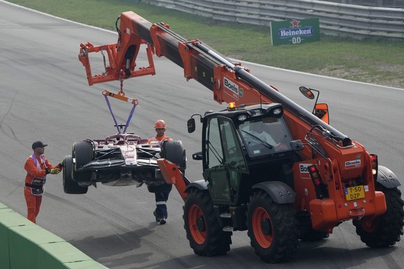 The car of Alfa Romeo driver Valtteri Bottas of Finland is removed from the track during the Formula One Dutch Grand Prix auto race, at the Zandvoort racetrack, in Zandvoort, Netherlands, Sunday, Sept ...