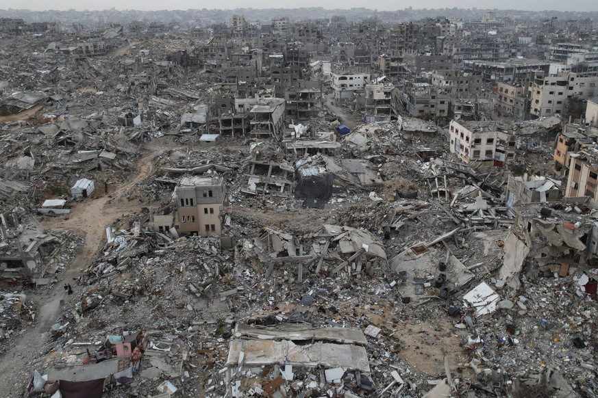 An aerial photograph taken by a drone shows the destruction caused by the Israeli air and ground offensive in Jabaliya, Gaza Strip, on Sunday, Feb. 16, 2025. (AP Photo/Mohammad Abu Samra)