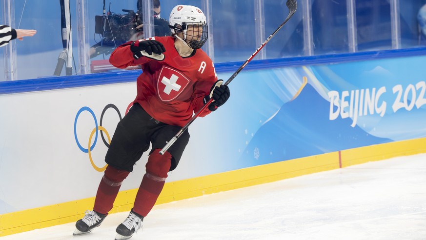 Switzerland's forward Alina Mueller celebrates her goal after scoring the 5:2, during the women's ice hockey semifinal game between Canada and Switzerland at the Wukesong Sports Centre at th ...