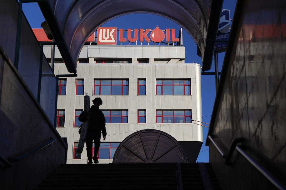 A person walks near the building of the Lukoil headquarters in Sofia, Bulgaria, Tuesday, Oct. 28, 2025. (AP Photo/ Valentina Petrova)
Bulgaria Lukoil
